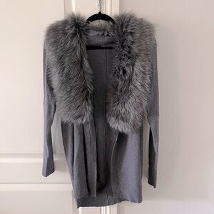Beautiful charcoal, colored sweater with fur- like collar . Great condition
